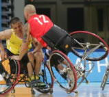 Paralympics Wheelchair Basketball. Andy  Blake (12) on 1 wheel for GB v Australia.  © ANA/M. MAROGIANNI